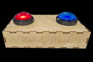 Wooden box with a red and blue buzzer on top