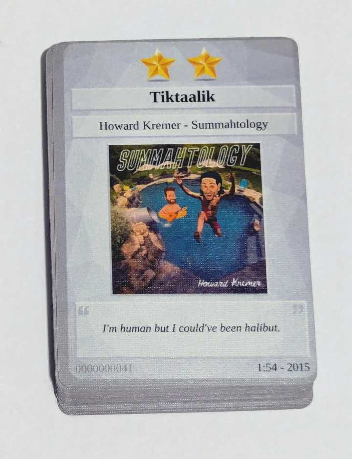 The face of a card, showing two stars, the song title, artist, album title, album art, duration, release year, and a quote from the lyrics. This card is Tiktaalik from Howard Kremer's Summahtology